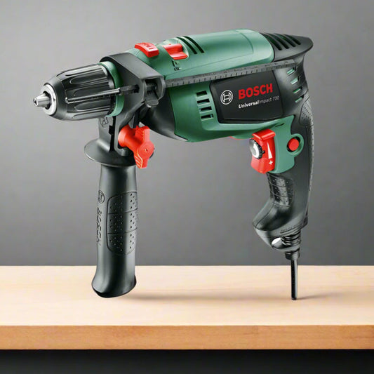 מקדחה  701W במזוודה  UNIVERSALIMPACT 700 - BOSCH