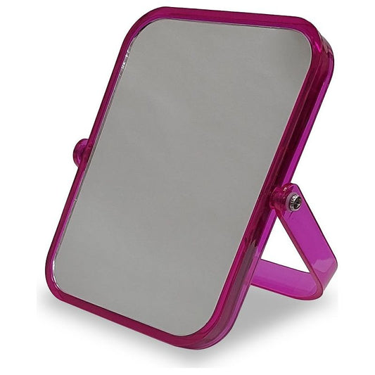 מראה עומדת במסגרת ורודה, על משטח לבן.