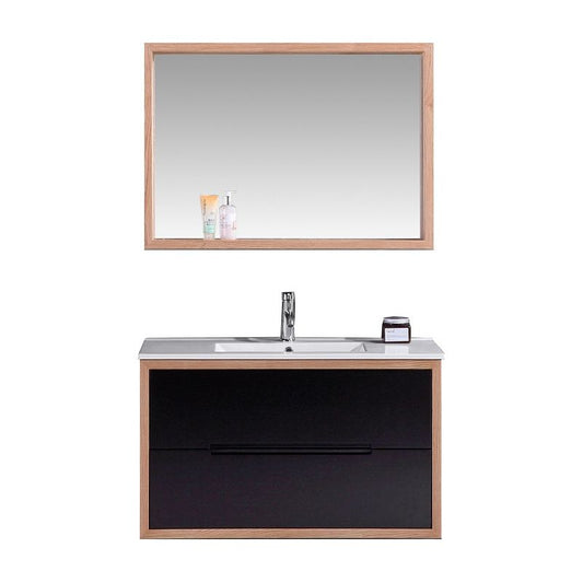 מראה וכיור עם ברז בחדר רחצה.